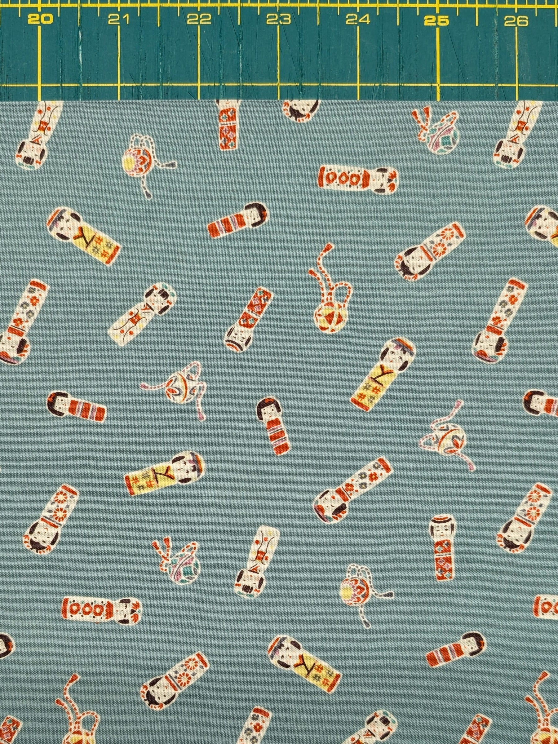 Cosmo - Kokeshi Doll Cotton Sheeting Fabric - Teal