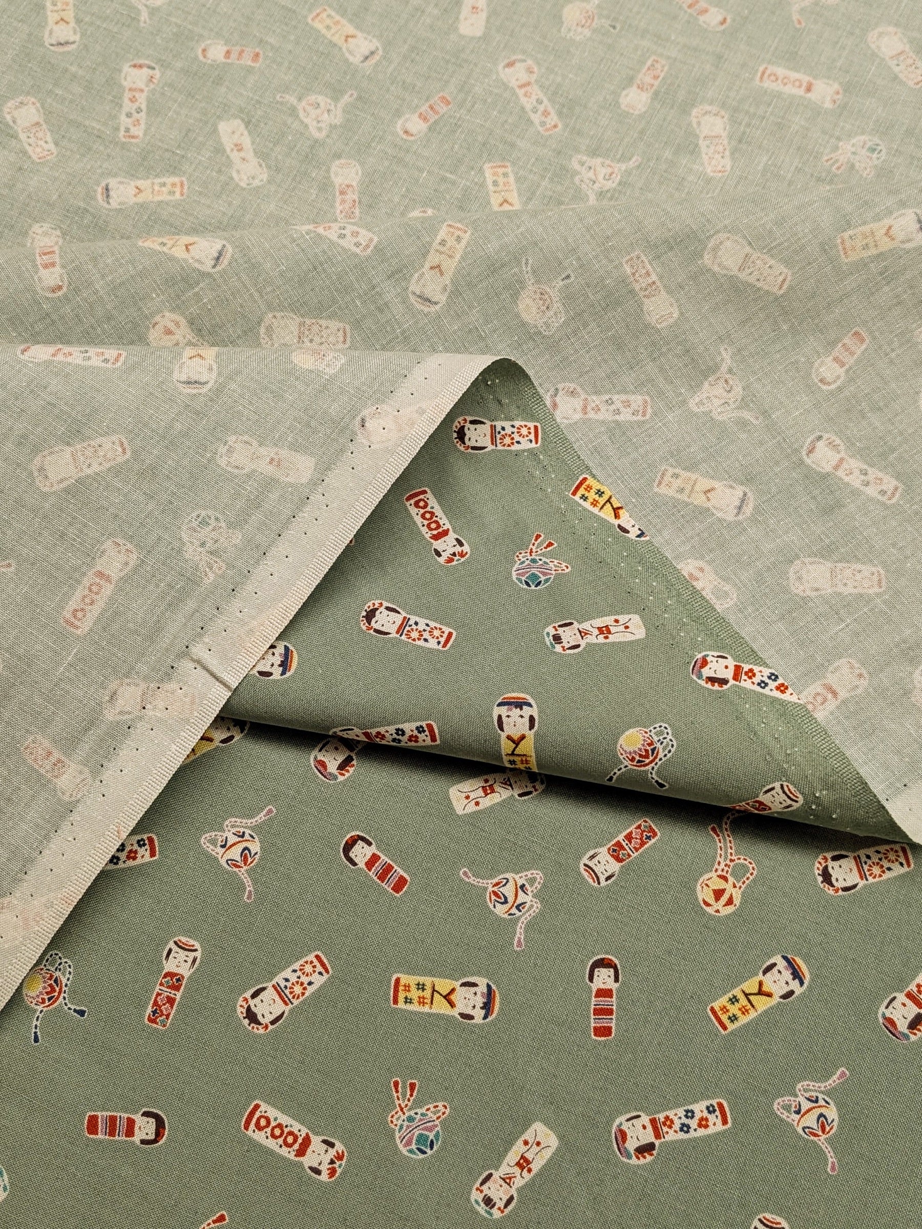 Cosmo - Kokeshi Doll Cotton Sheeting - Green