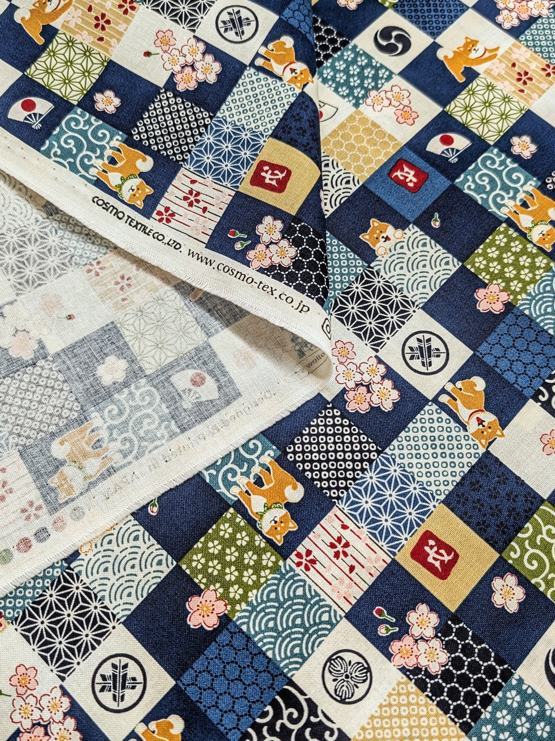 Cosmo - Checkerboard Shibas Cotton Sheeting - Blue