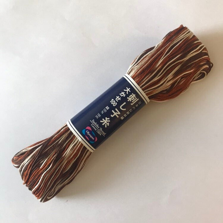 Olympus - Cotton Sashiko Thread 100m Skein - Color #153 Variegated White, Tan & Brown