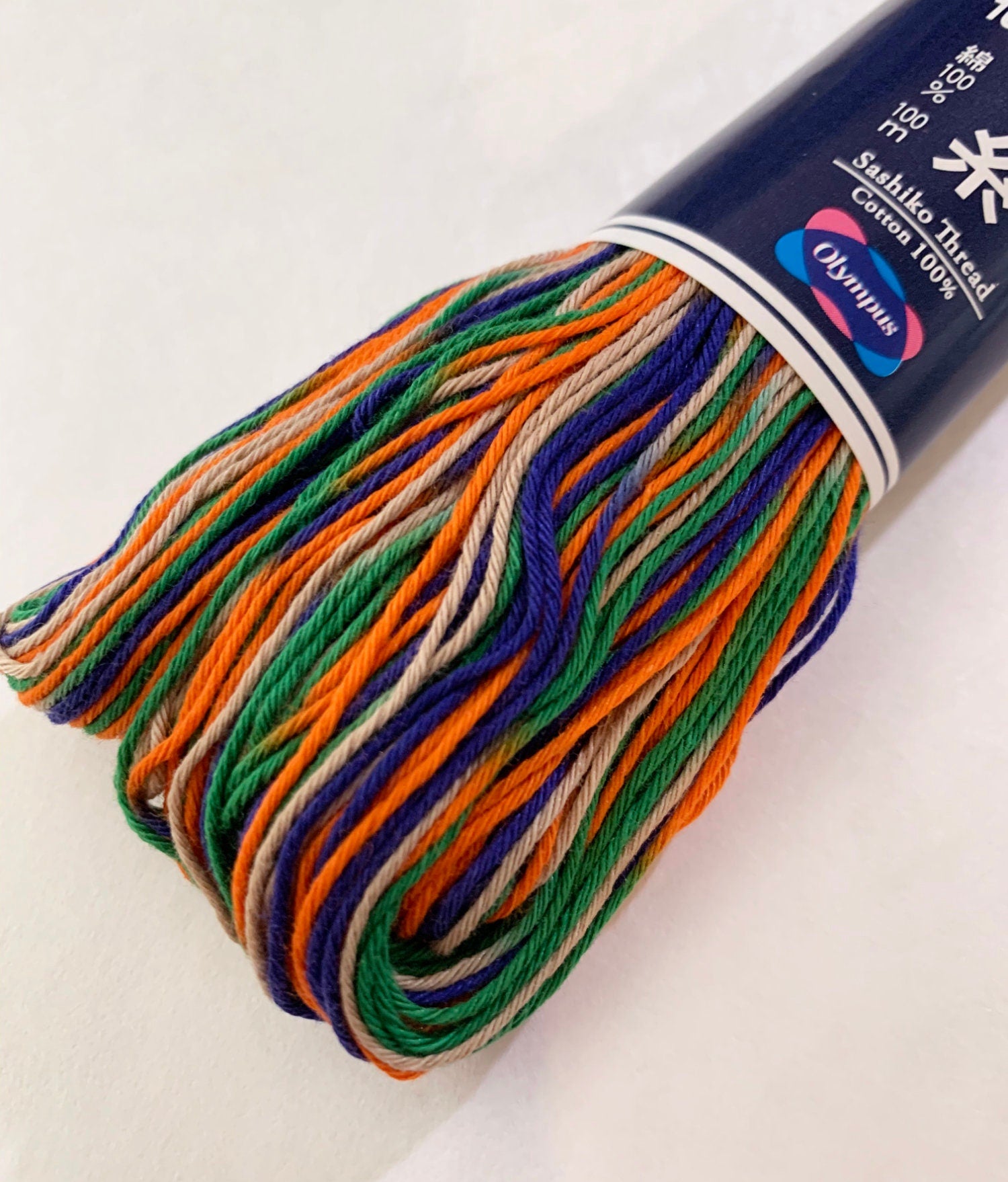 Olympus - Cotton Sashiko Thread 100m Skein - Color #172 Variegated Orange Blue Green