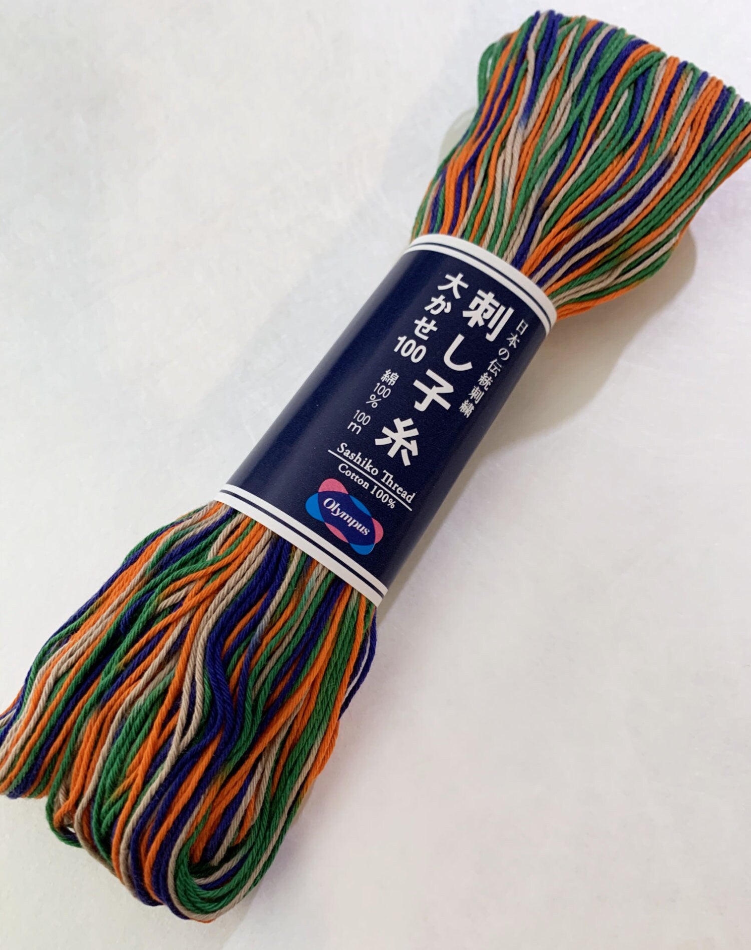 Olympus - Cotton Sashiko Thread 100m Skein - Color #172 Variegated Orange Blue Green