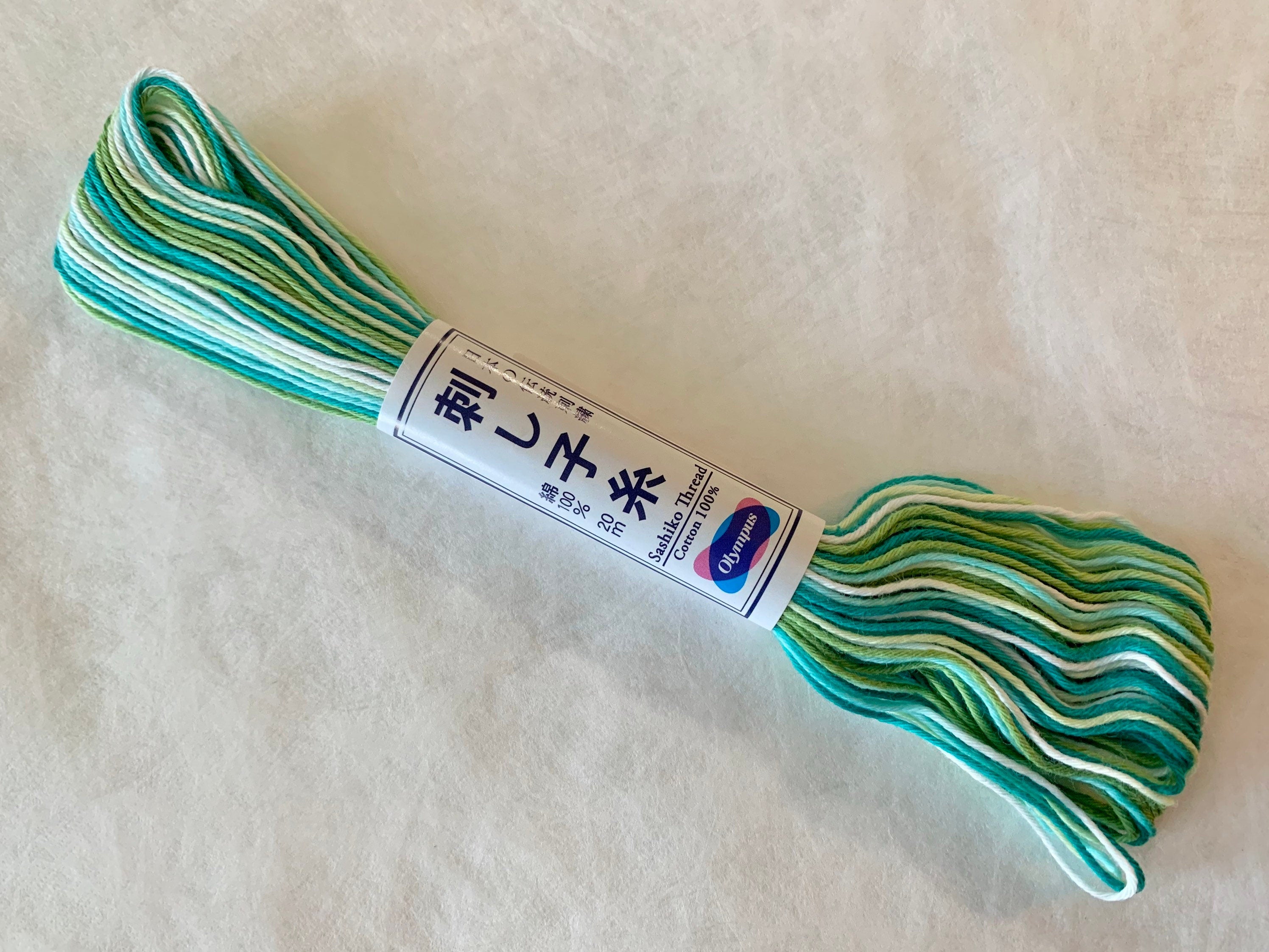 Olympus - Cotton Sashiko Thread 20m Skein - Color #51 Variegated Green