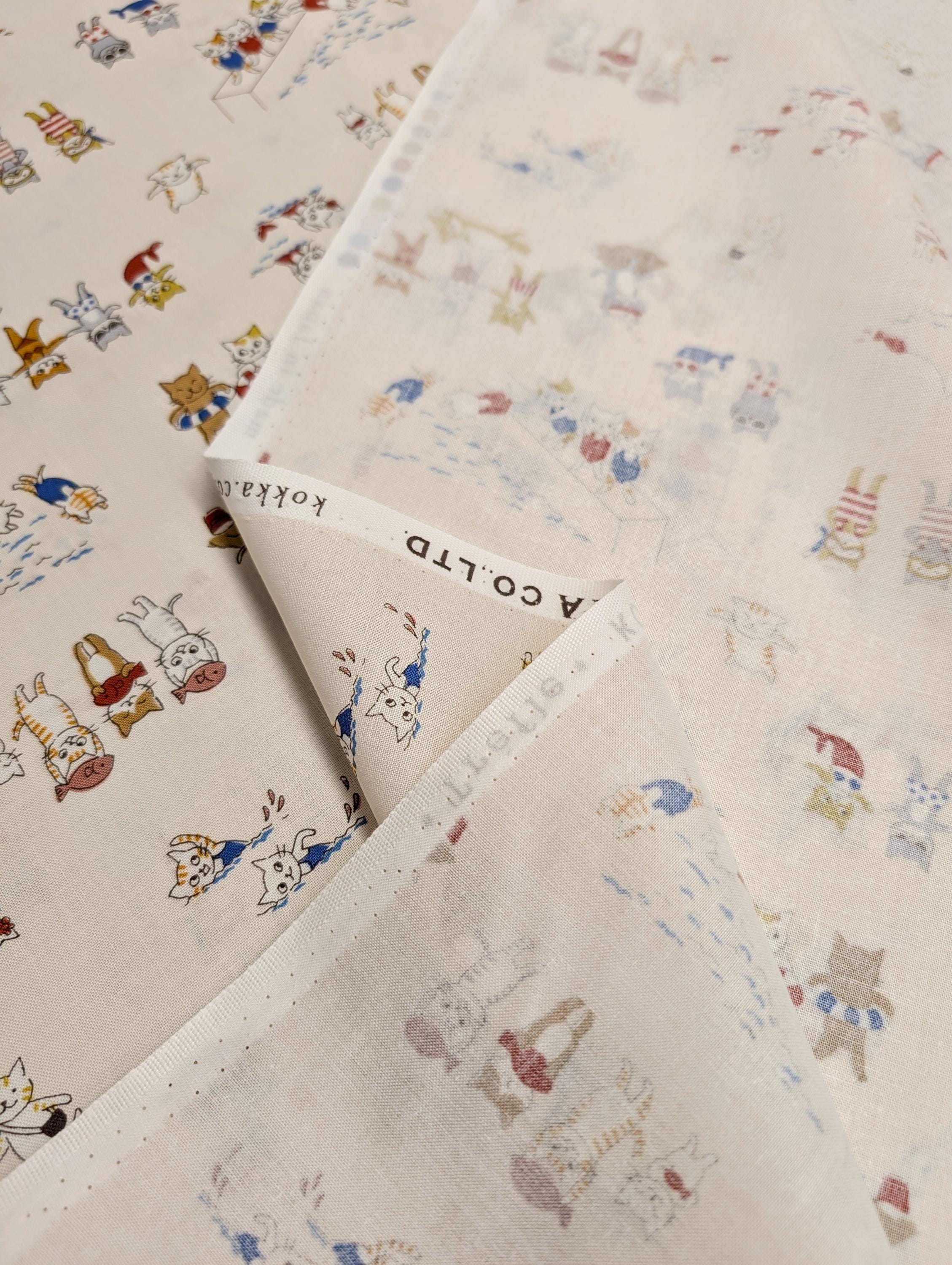 Kokka Beach Cats Trèfle Japanese cotton fabric YKA-21030-1 A off-white