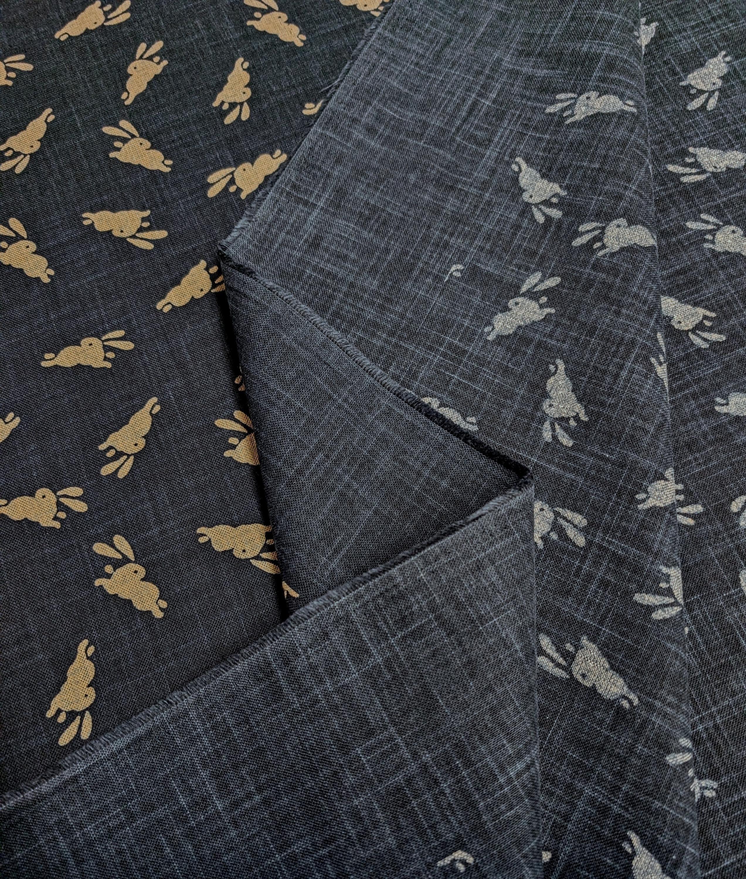 Bouncing Bunnies hand stenciled Japanese cotton fabric KP7090-95 A blue - half yard