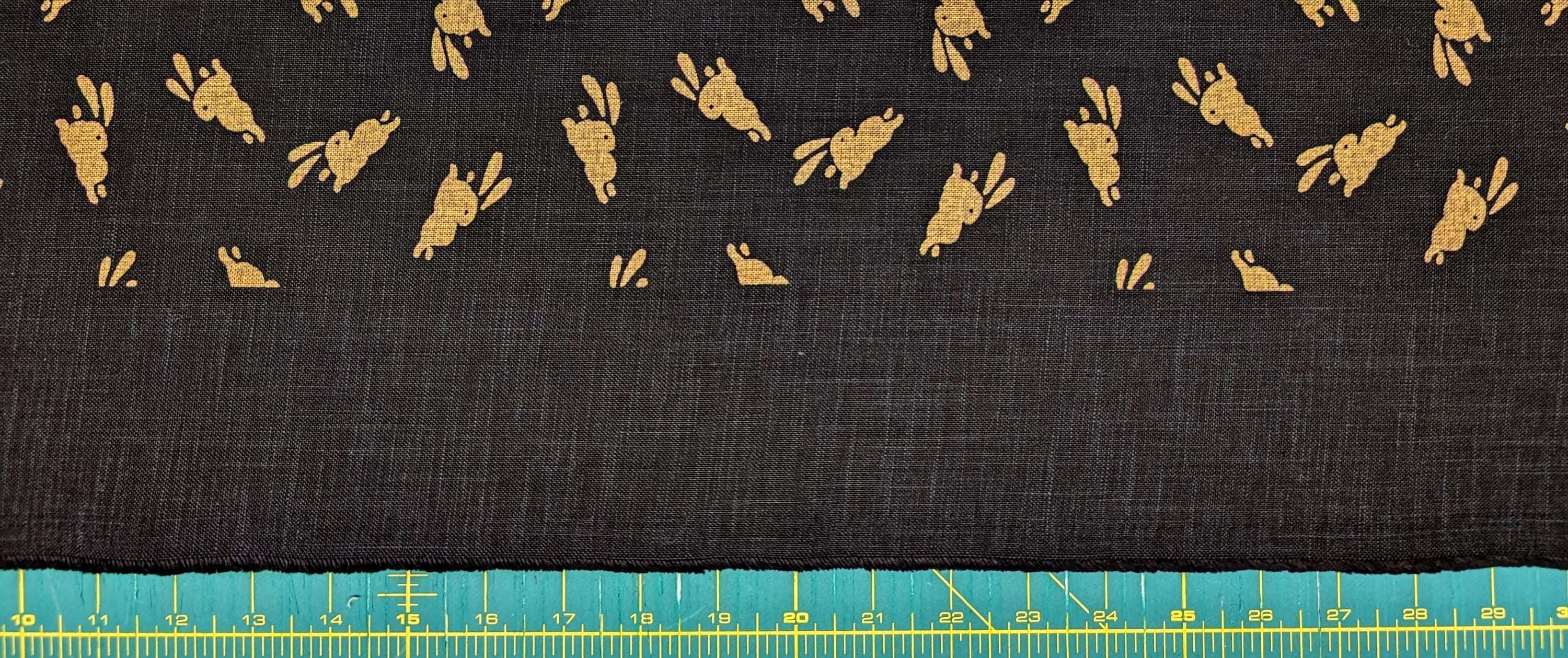Kurenai - Bounding Rabbits Hand Stenciled Cotton Fabric - Black and Beige