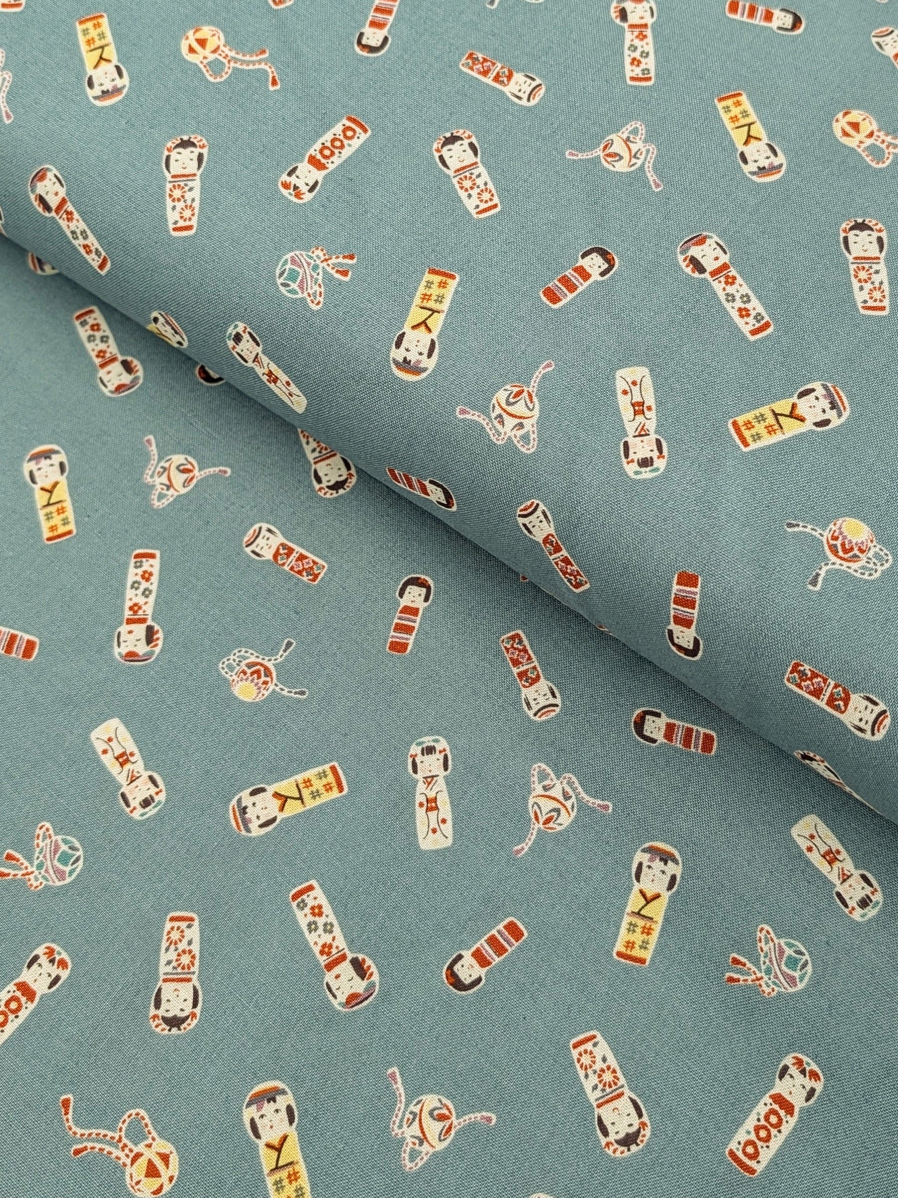 Cosmo - Kokeshi Doll Cotton Sheeting Fabric - Teal
