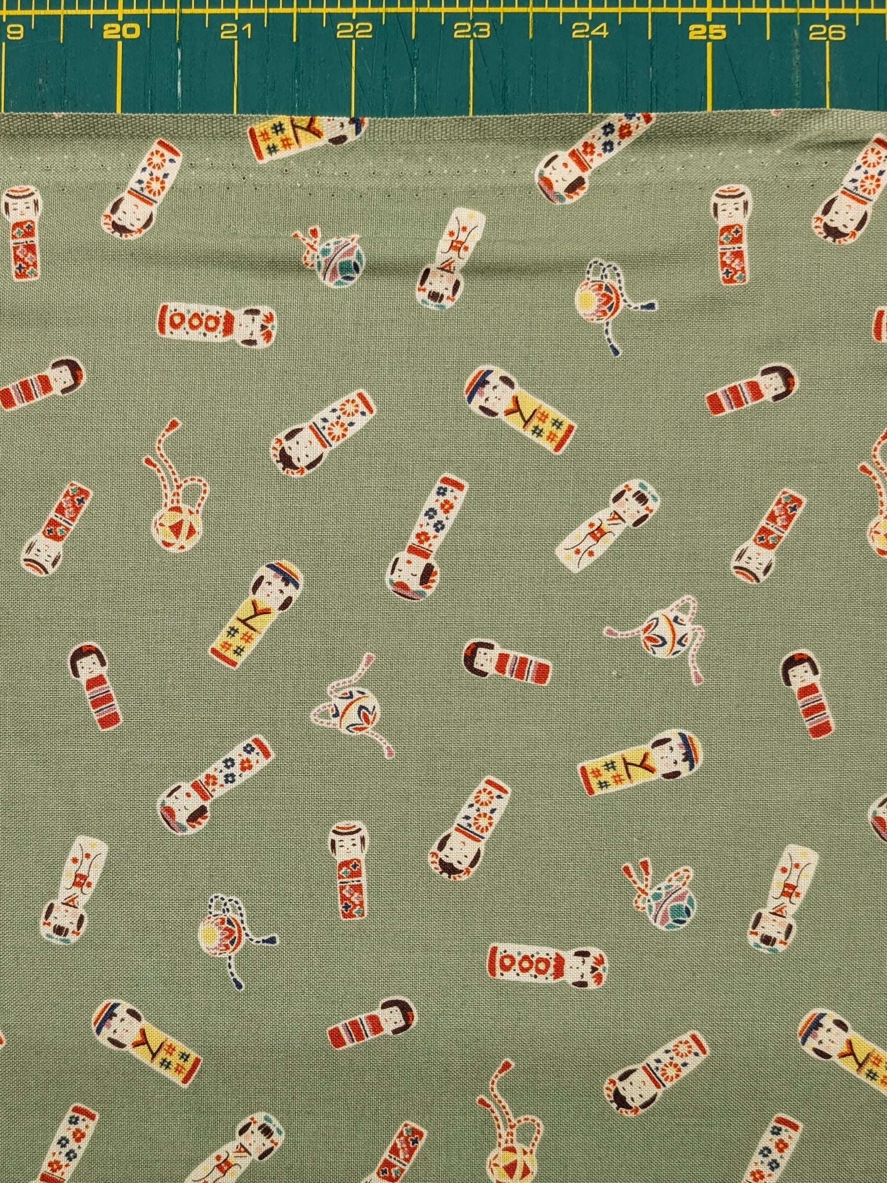 Cosmo - Kokeshi Doll Cotton Sheeting - Green