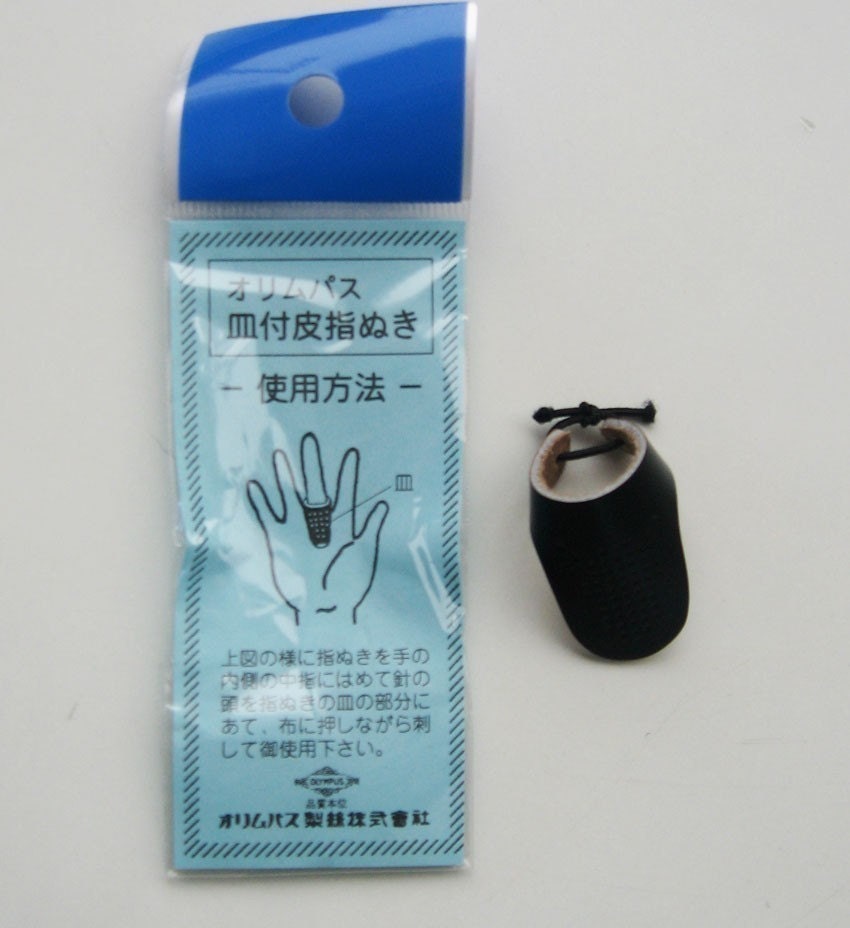 Olympus Sashiko leather palm thimble for traditional Japanese quilting