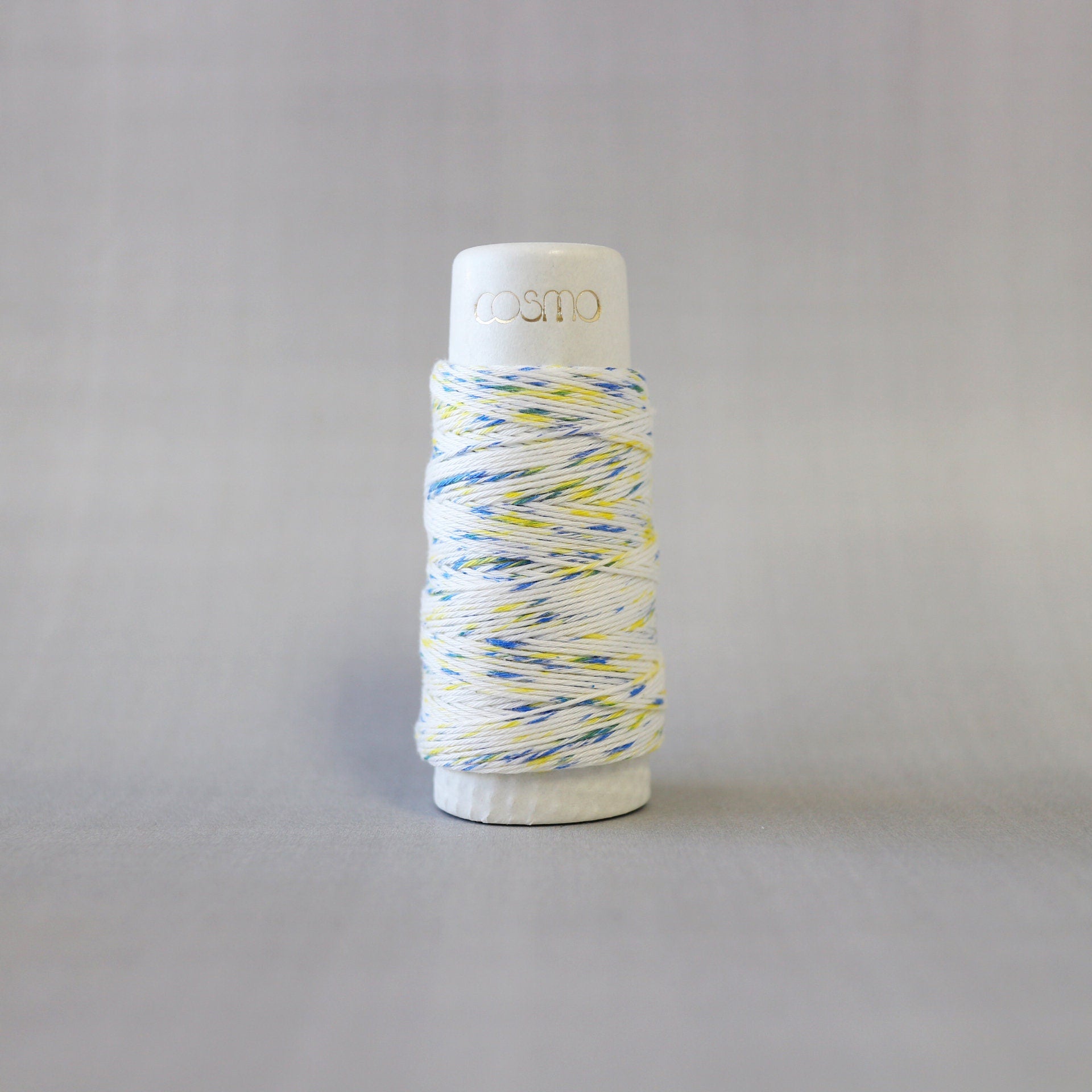 Lecien Cosmo - 'Hidamari' Cotton Sashiko Thread 30m Spool - Shaved Ice Blue Yellow (Speckle)