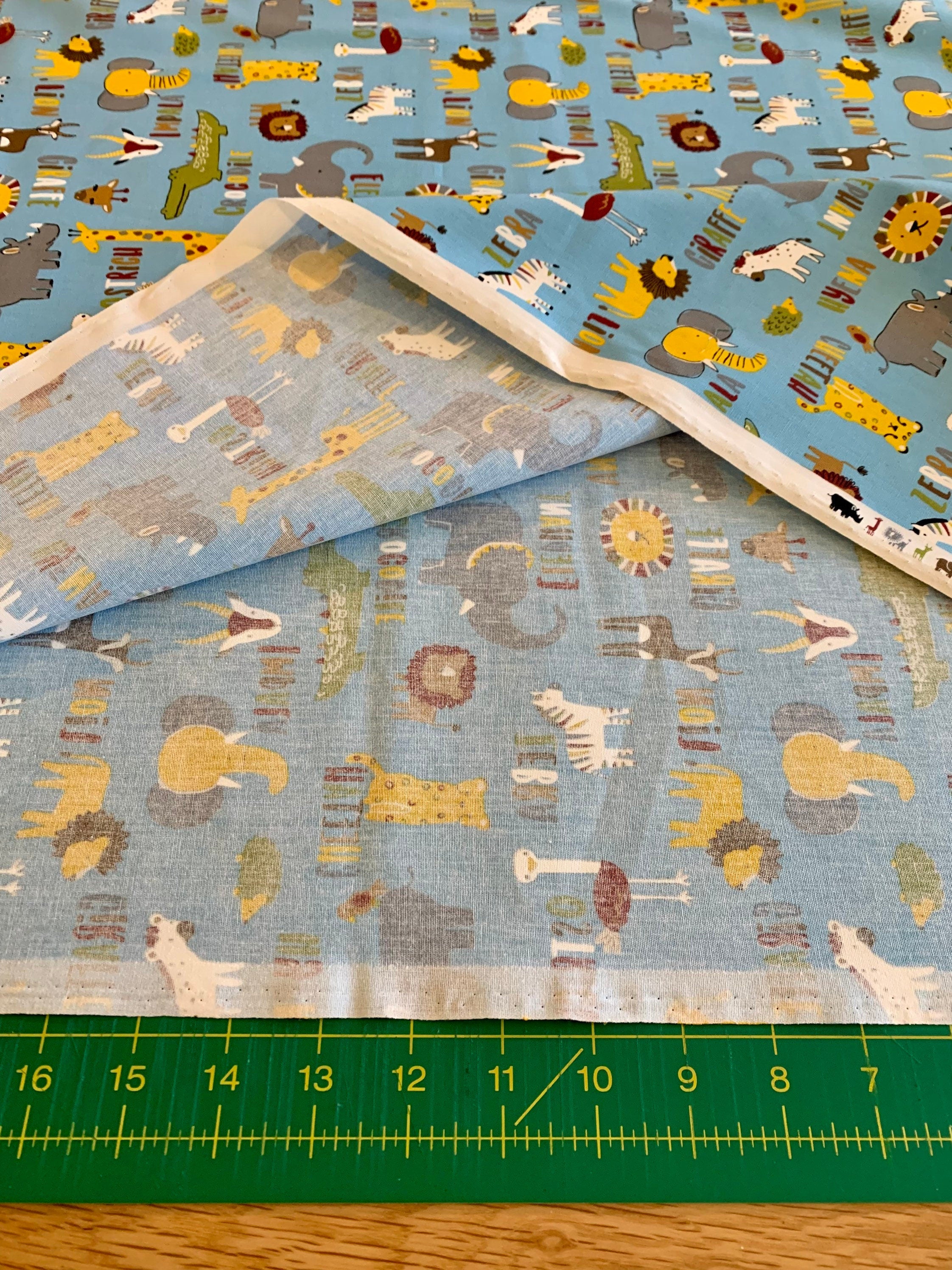 Hishiei - SALE Wild Savanah Animals Cotton Fabric - Light Blue