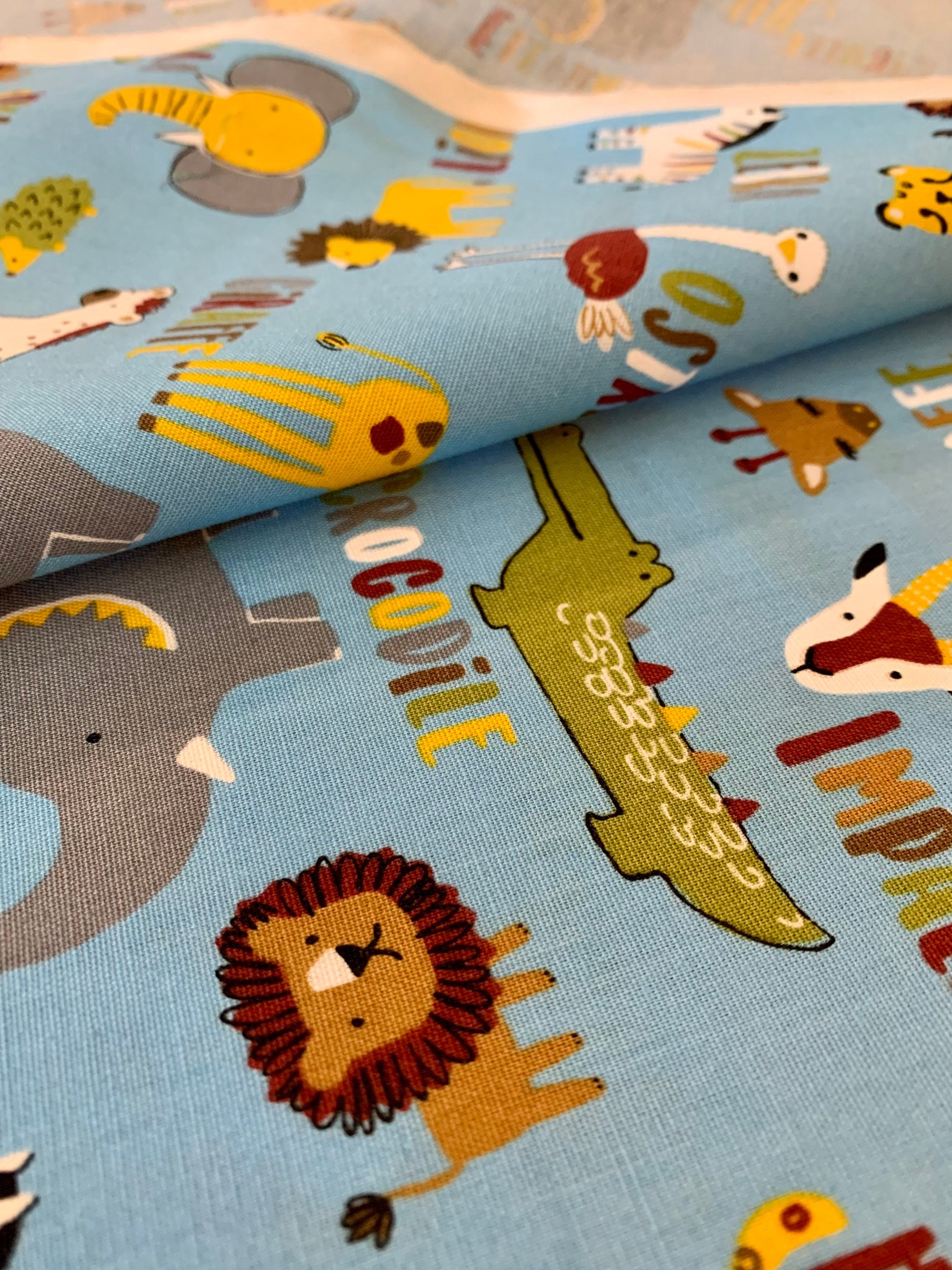 Hishiei - SALE Wild Savanah Animals Cotton Fabric - Light Blue