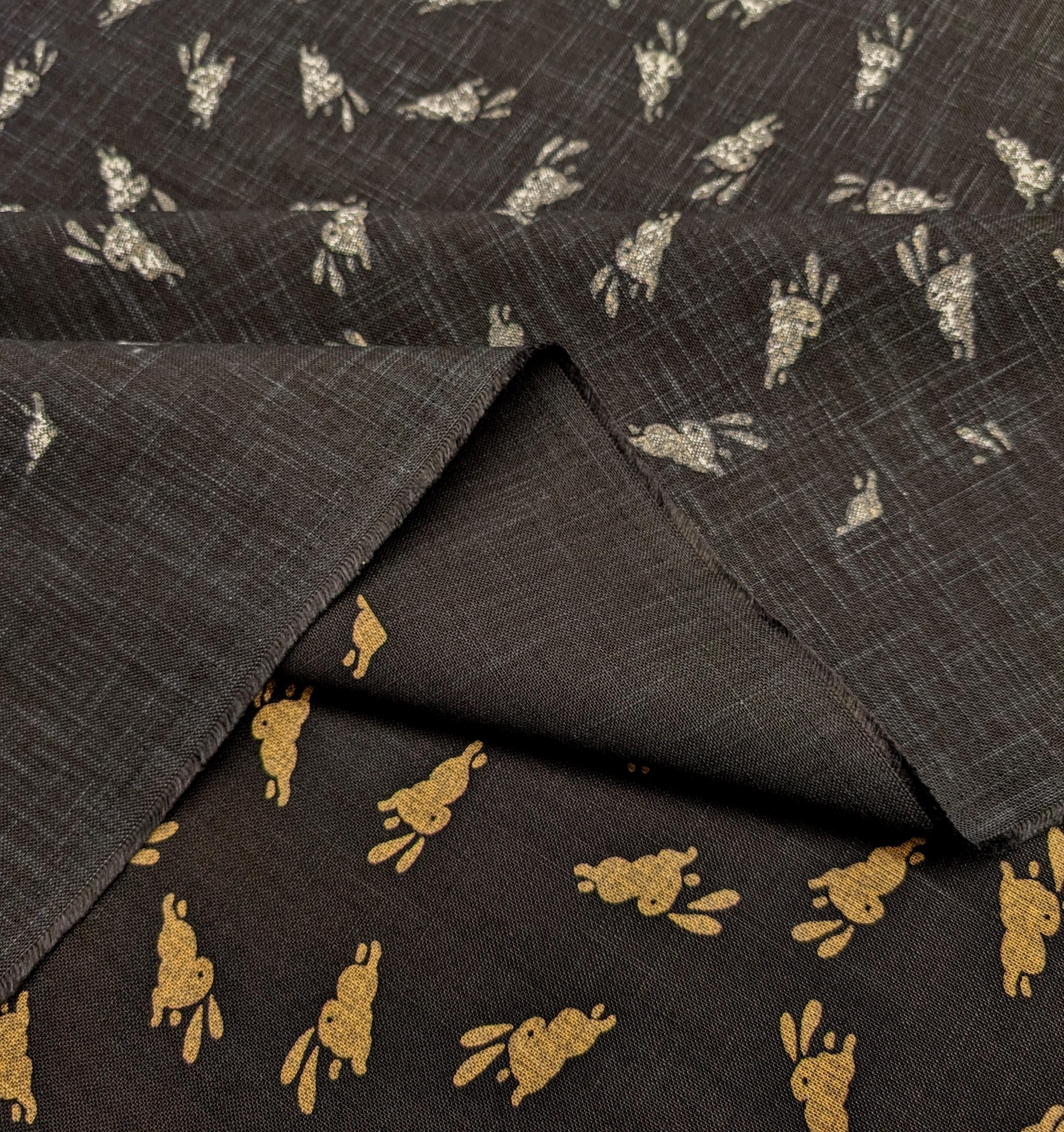 Hand Stenciled Bounding Rabbits Japanese cotton fabric KP7090- black & beige - half yard