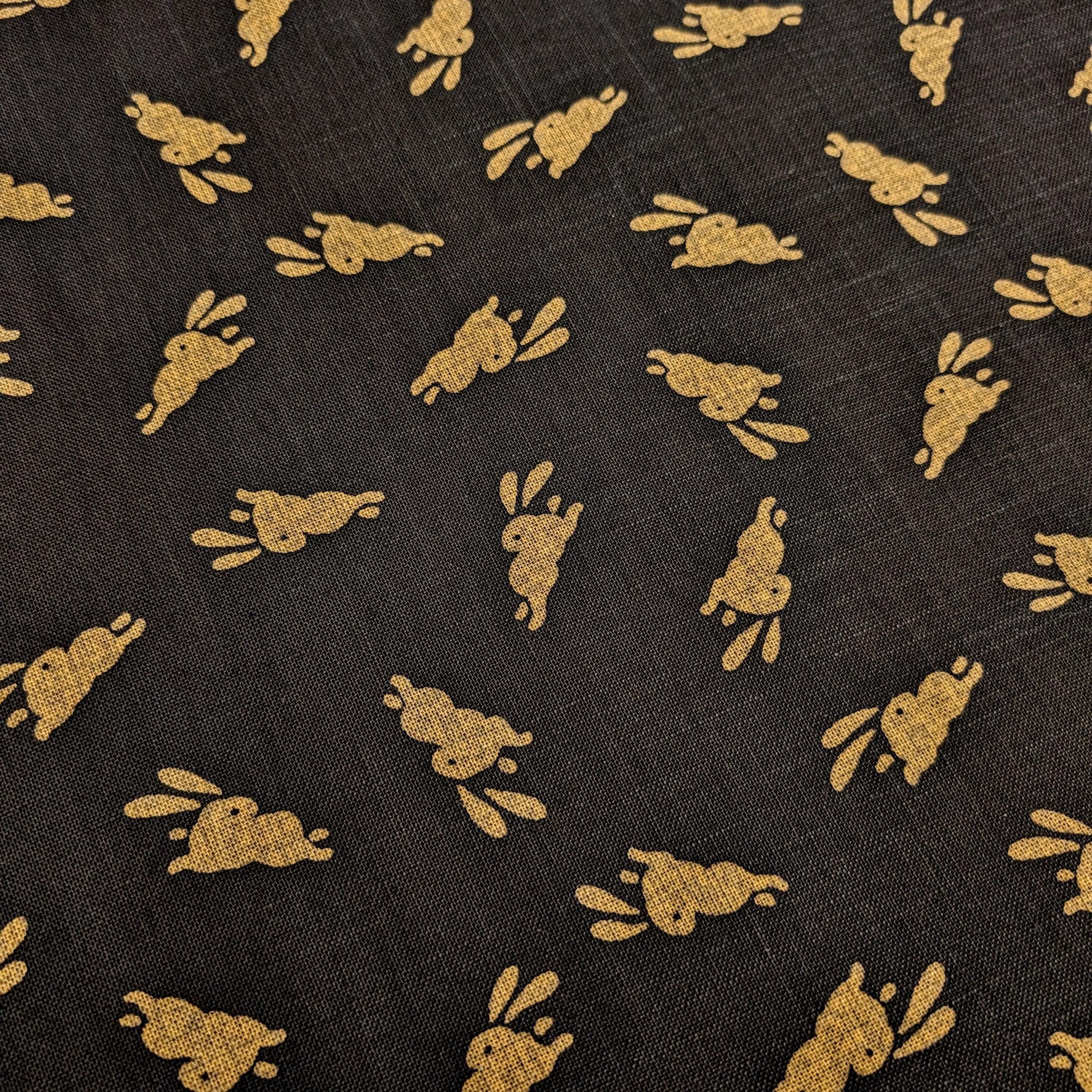 Hand Stenciled Bounding Rabbits Japanese cotton fabric KP7090- black & beige - half yard