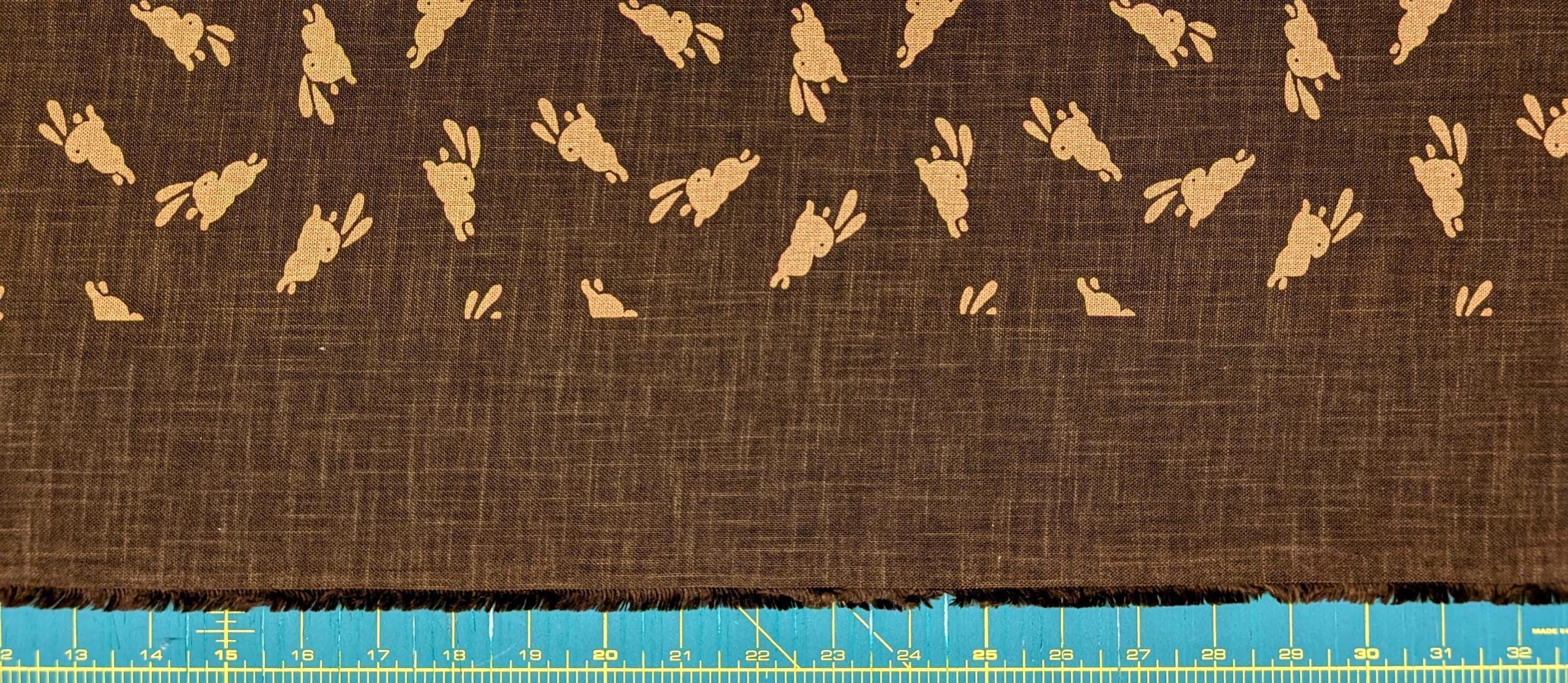 Bouncing Bunnies hand stenciled Japanese cotton fabric KP7090-95 C brown- half yard
