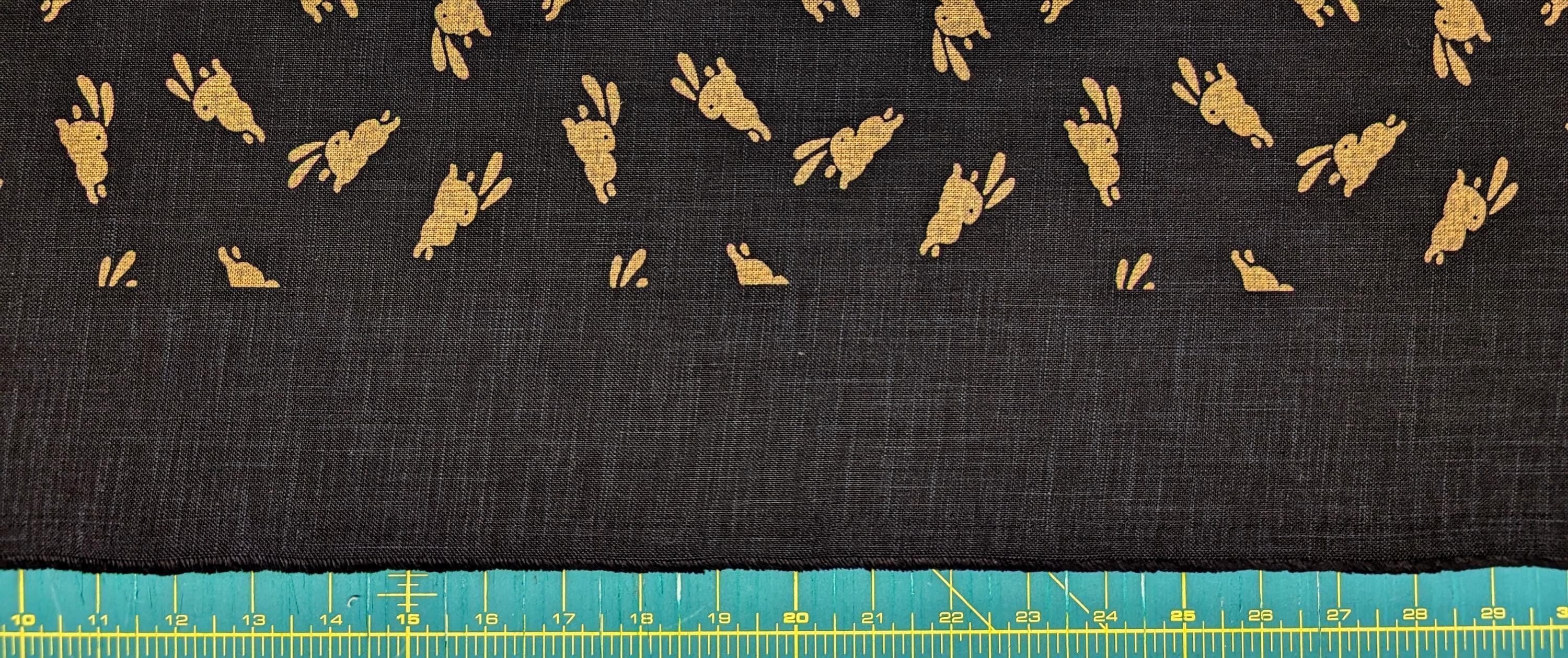Bouncing Bunnies hand stenciled Japanese cotton fabric KP7090-95 D black - half yard